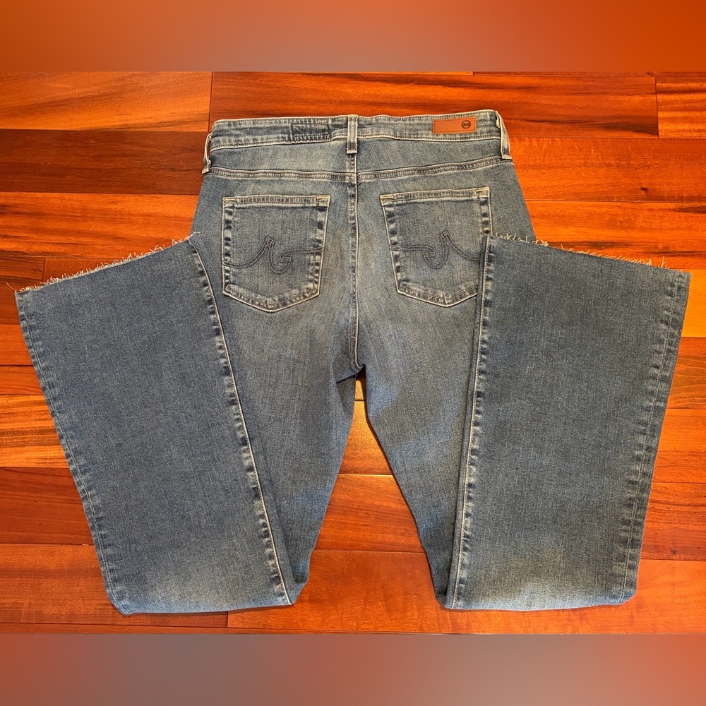 AG Los Angeles Woman’s Ferrah Bootcut Mid Rise Raw Hem Jeans Size 31